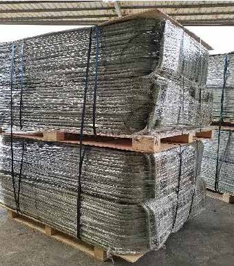 Packaged mesh panels on pallets in warehouse